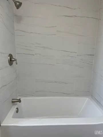 a bathroom with a bathtub