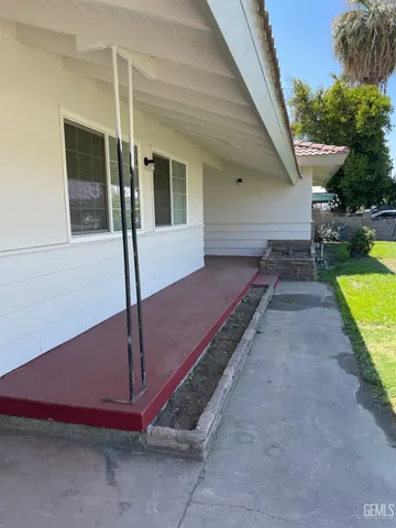a view of a backyard with a patio