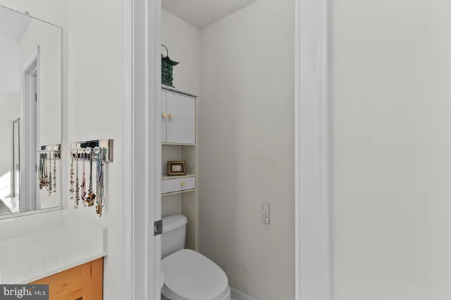 a bathroom with a sink double vanity and a mirror