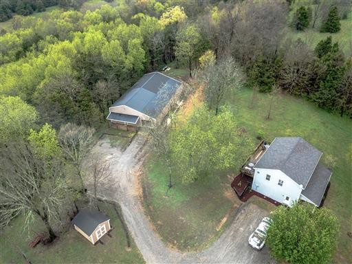 325 Osborne Road Watertown, TN 37184 - Photo 1 of 31 an aerial view of a house with outdoor space and street view