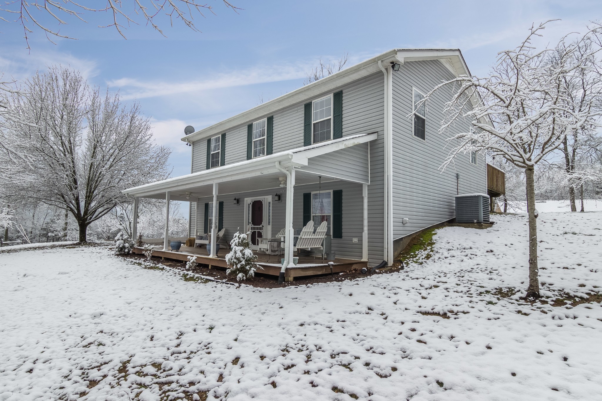 325 Osborne Road Watertown, TN 37184 - Photo 3 of 31 a view of a house with a snow on the road