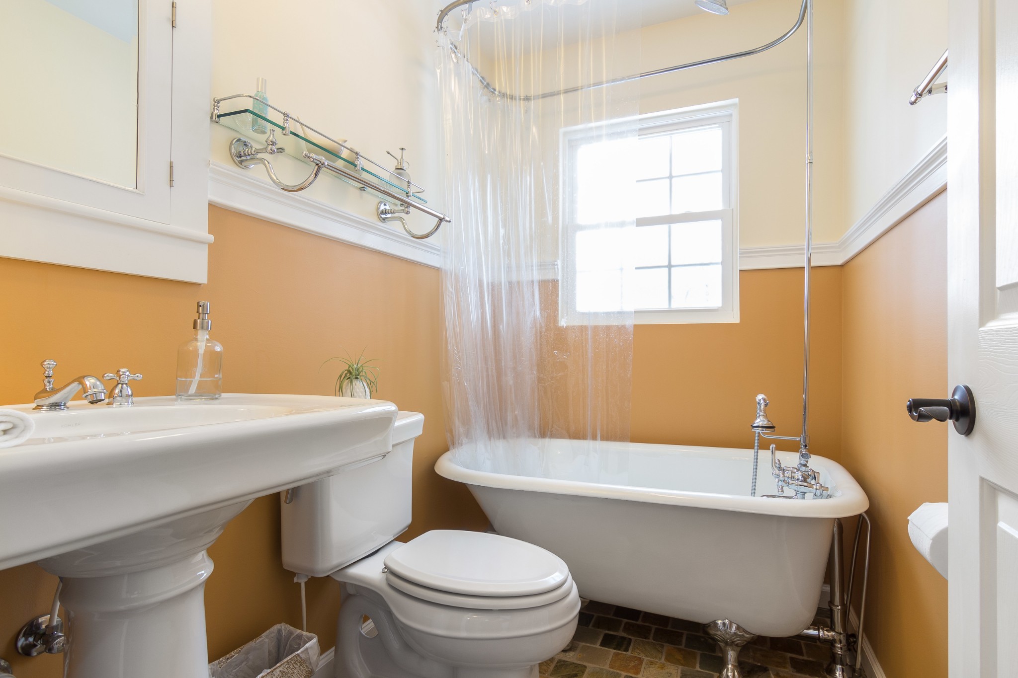 325 Osborne Road Watertown, TN 37184 - Photo 22 of 31 a bathroom with a sink a toilet a mirror and bathtub