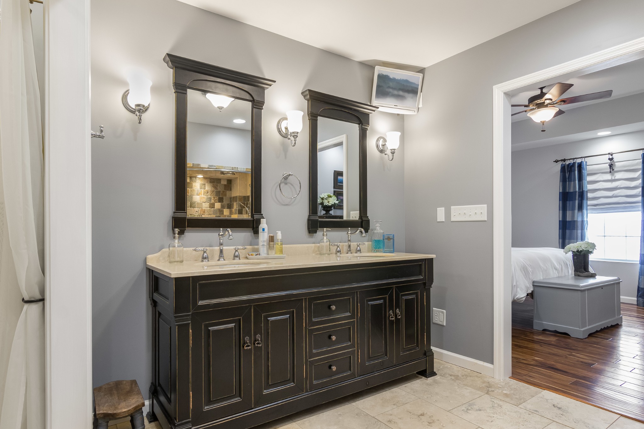 325 Osborne Road Watertown, TN 37184 - Photo 8 of 31 a spacious bathroom with a granite countertop sink and a mirror