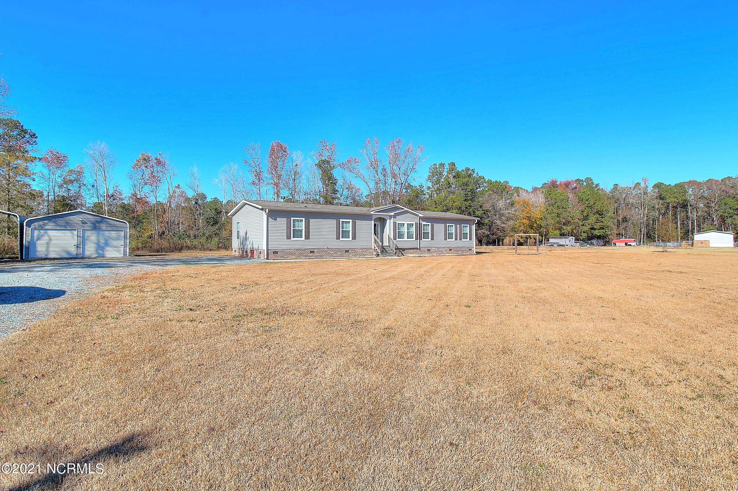 6965 Maple Road Northwest Ash, NC 28420 - Photo 3 of 21 Front