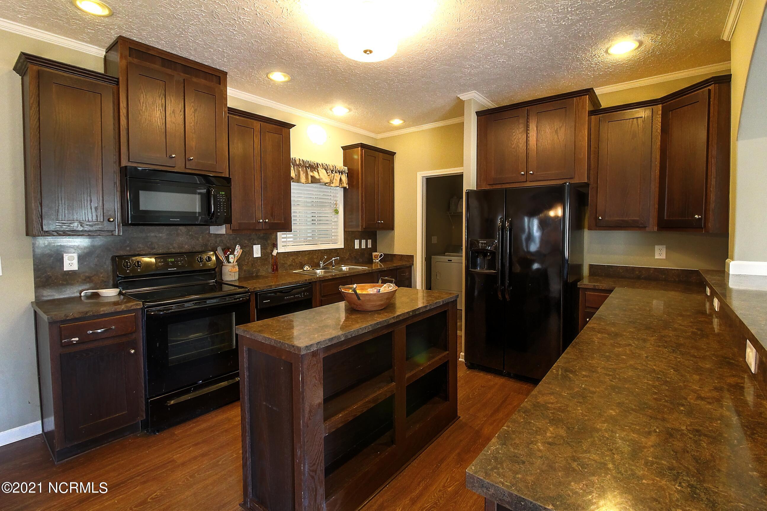6965 Maple Road Northwest Ash, NC 28420 - Photo 6 of 21 Kitchen 3