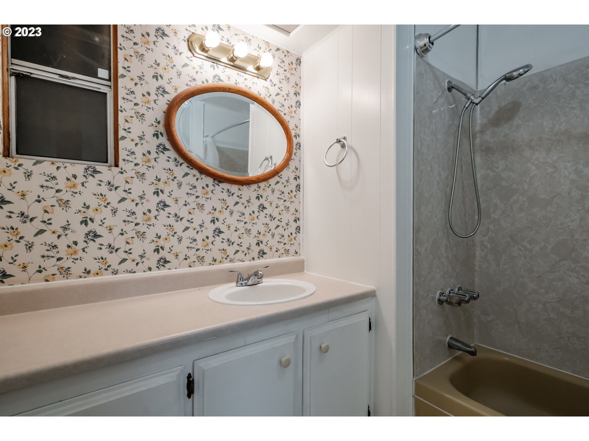 24333 Vaughn Road Veneta, OR 97487 - Photo 13 of 27 a bathroom with a sink and a mirror
