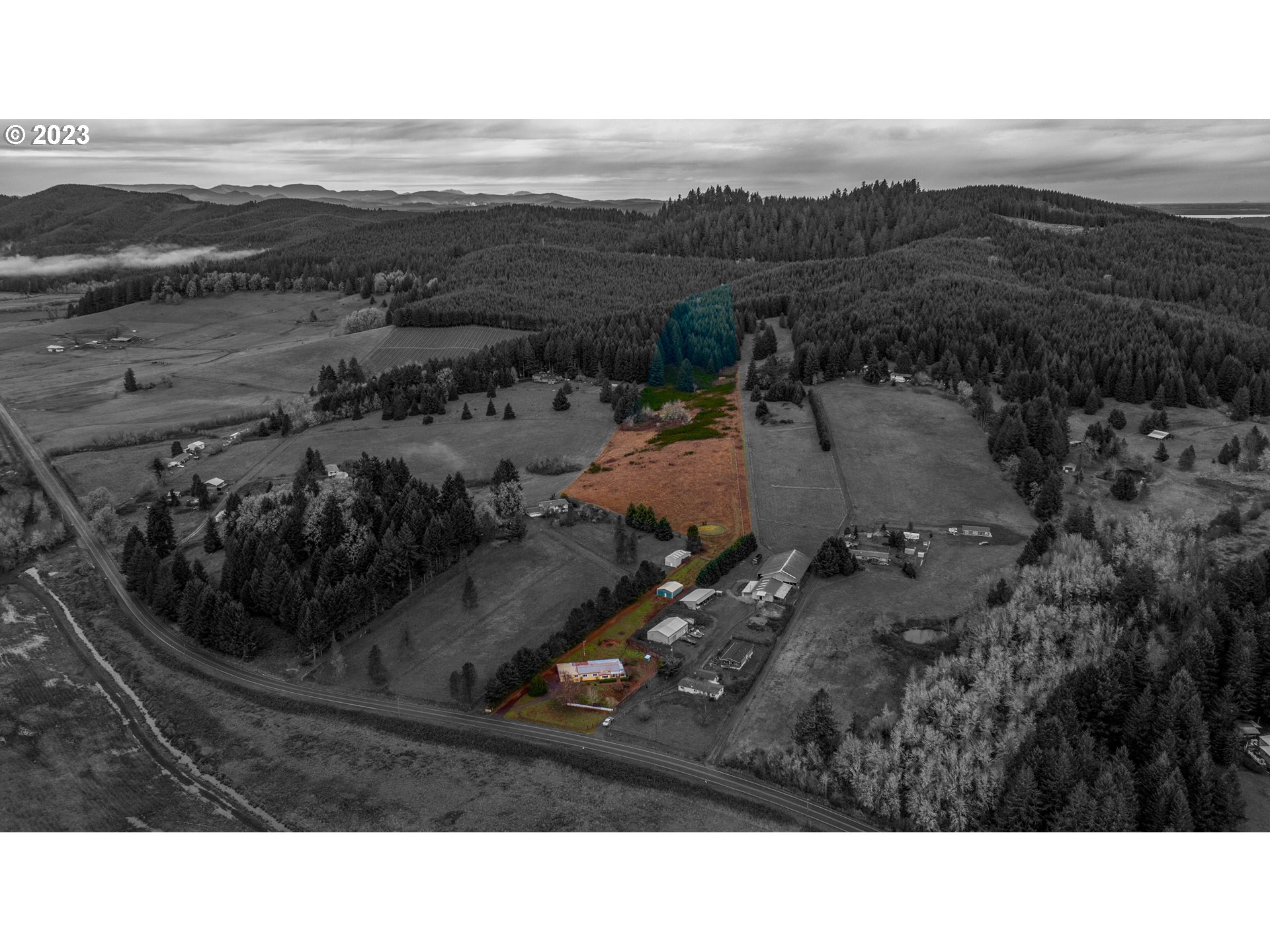 24333 Vaughn Road Veneta, OR 97487 - Photo 2 of 27 a black and white photo of a city