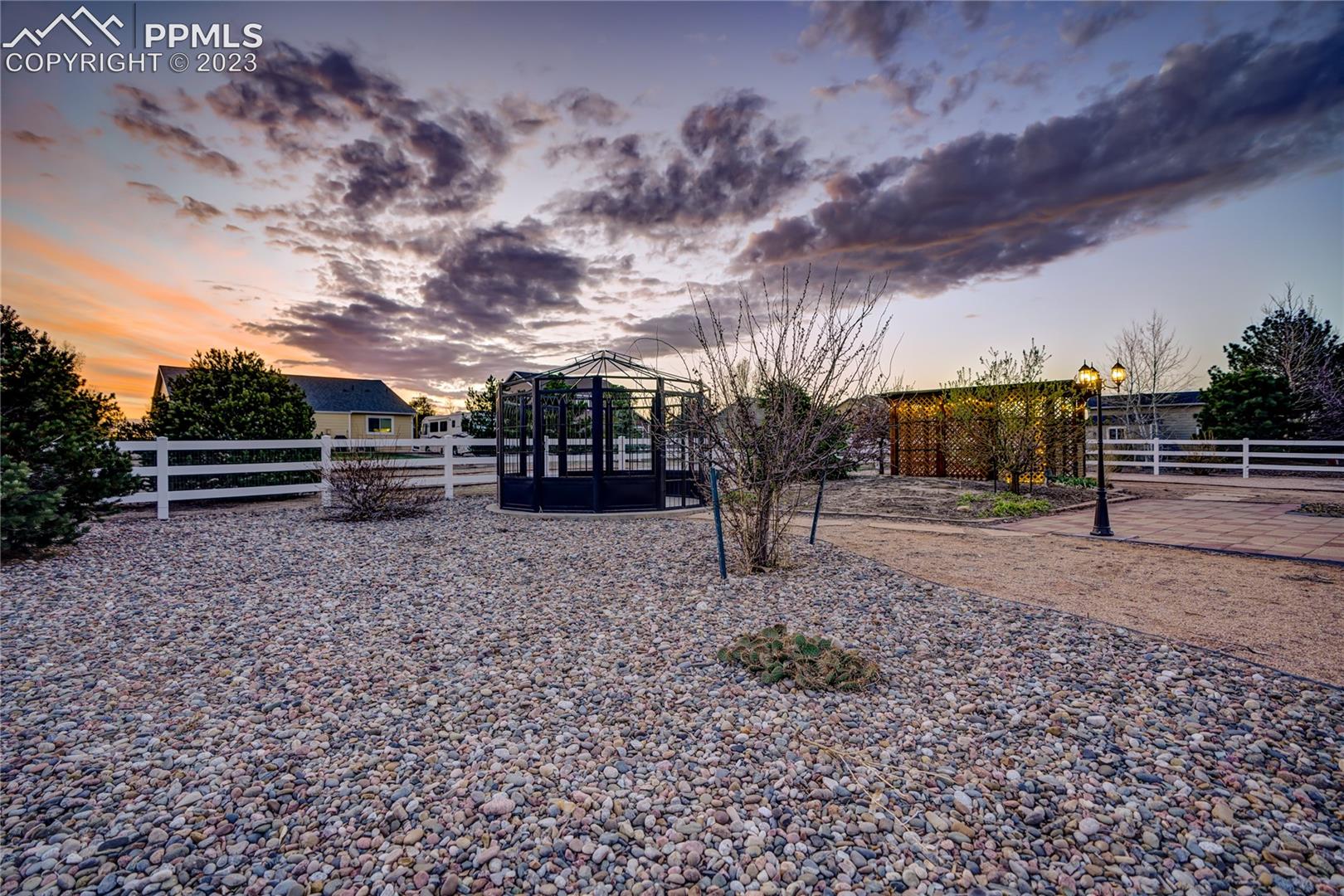7730 Midnight Road Peyton, CO 80831 - Photo 43 of 50 Alternate view Gazebo 2 on a concrete pad with GFI outlet