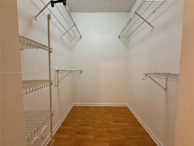 a view of a room with racks on the wall
