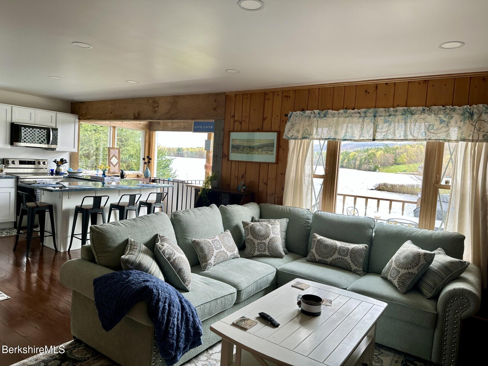 210 Shore Road Richmond, MA 01201 - Photo 11 of 22 a living room with furniture and a large window