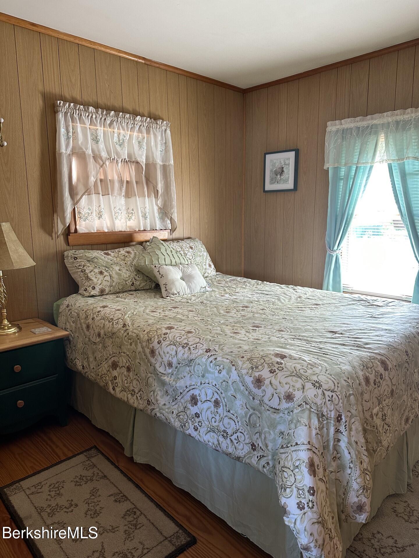 210 Shore Road Richmond, MA 01201 - Photo 15 of 22 a bedroom with a bed and a window