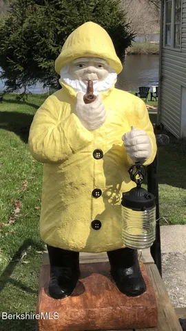 a view of swimming pool with a yard