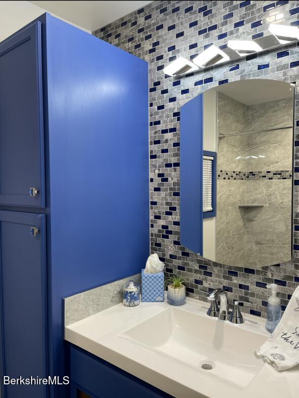 210 Shore Road Richmond, MA 01201 - Photo 7 of 22 a bathroom with a sink and a mirror