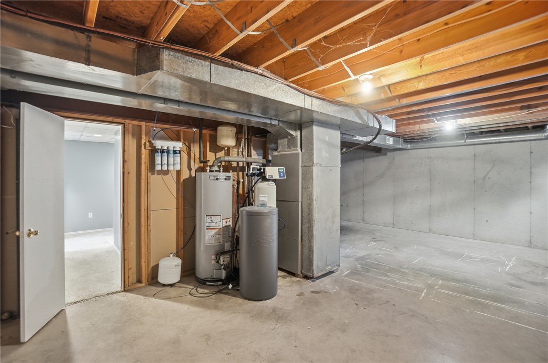 10 Chase Court Springboro, OH 45066 - Photo 60 of 75 This spacious basement offers ample potential for customization and storage.