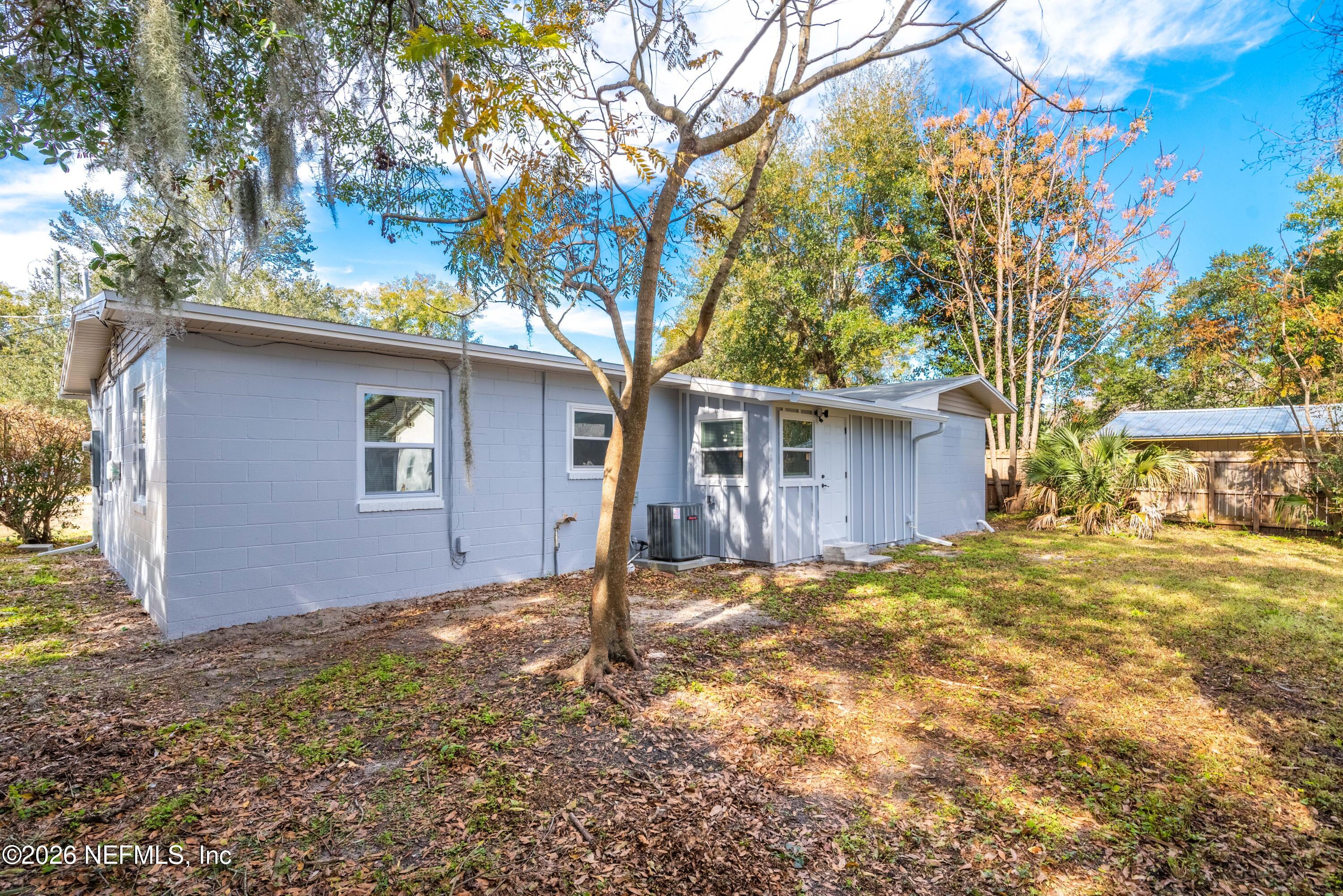 529 Sapelo Road Jacksonville, FL 32216 - Photo 27 of 31 a house with trees in the background