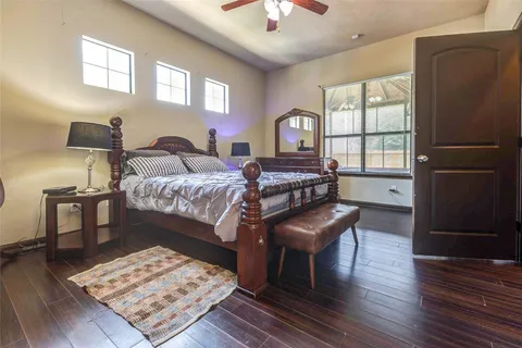 a bed room with a bed furniture and a window