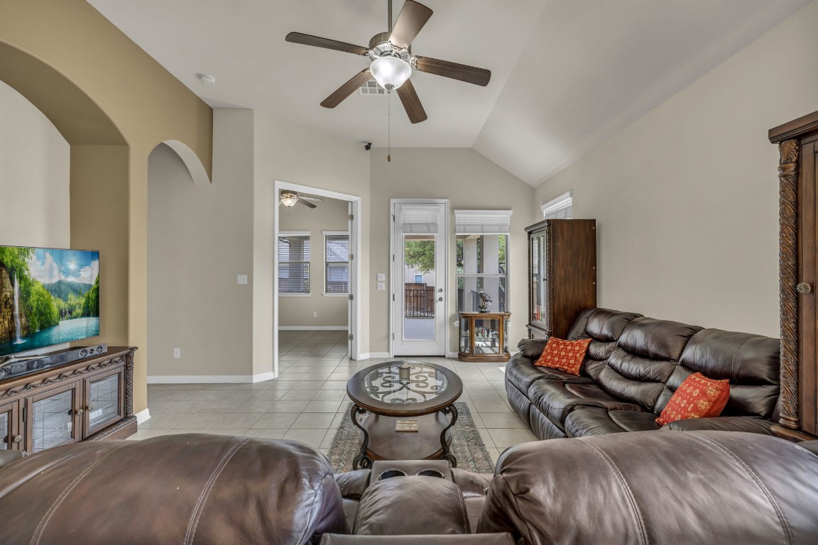 3821 Tordera Drive Austin, TX 78738 - Photo 14 of 30 a living room with furniture and a flat screen tv