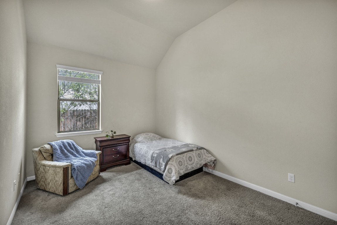 3821 Tordera Drive Austin, TX 78738 - Photo 20 of 30 a living room with a couch and a window