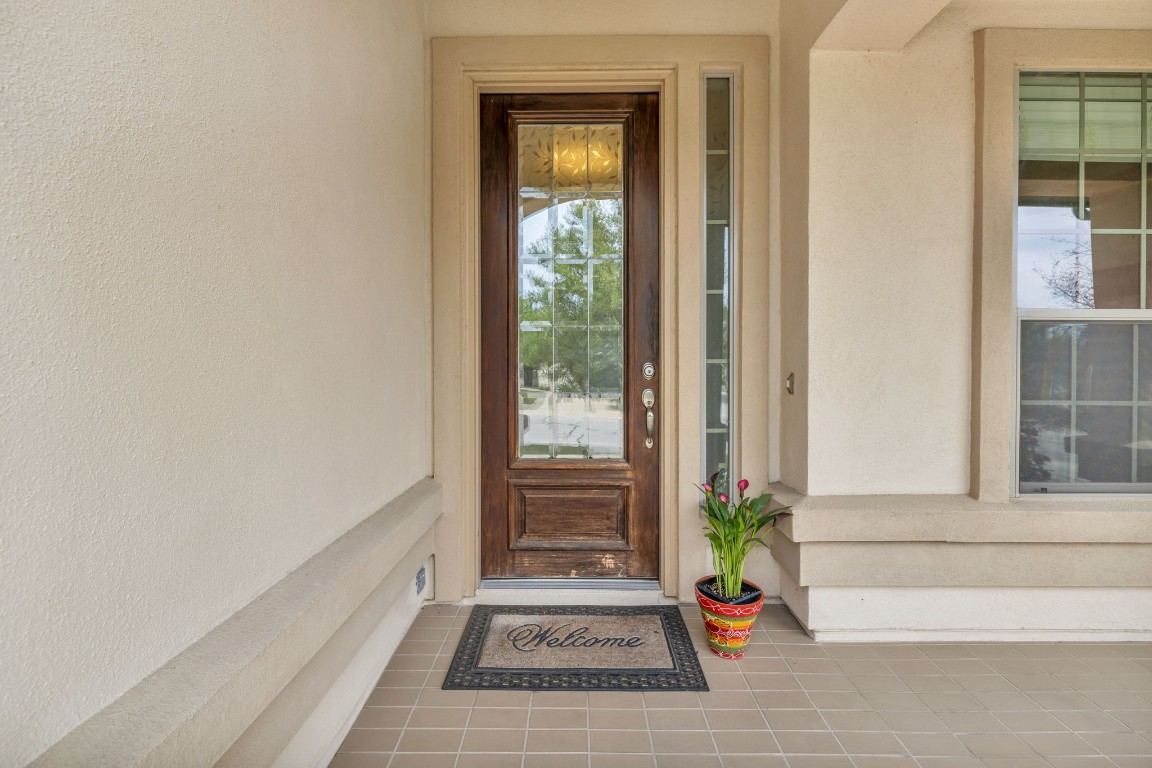 3821 Tordera Drive Austin, TX 78738 - Photo 3 of 30 a view of a door and chair in front of a door