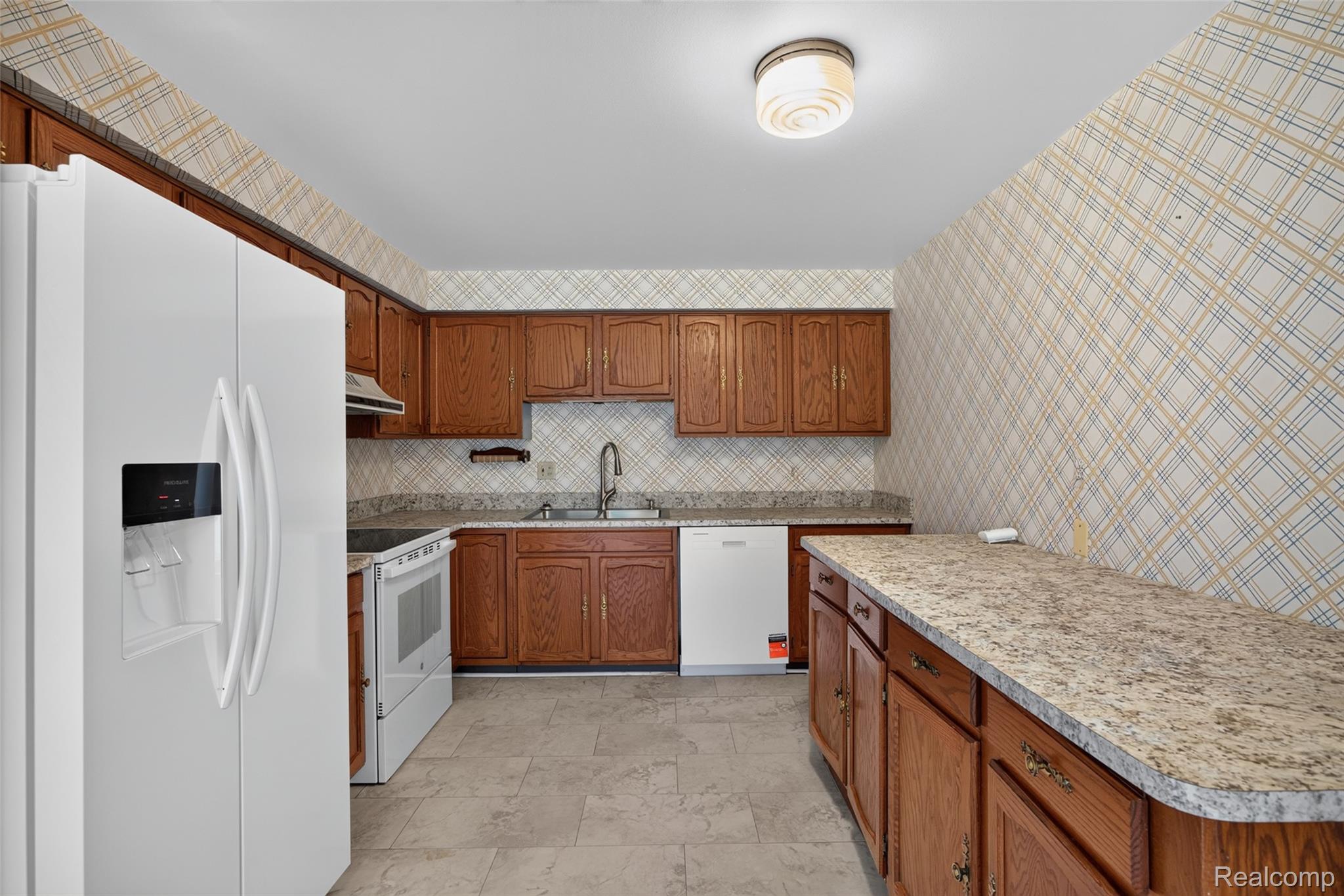 1225 Derby Road, Unit 3 Birmingham, MI 48009 - Photo 7 of 19 Brand new side by side refrigerator and dishwasher Washer and Dryer are in the cabinets on right