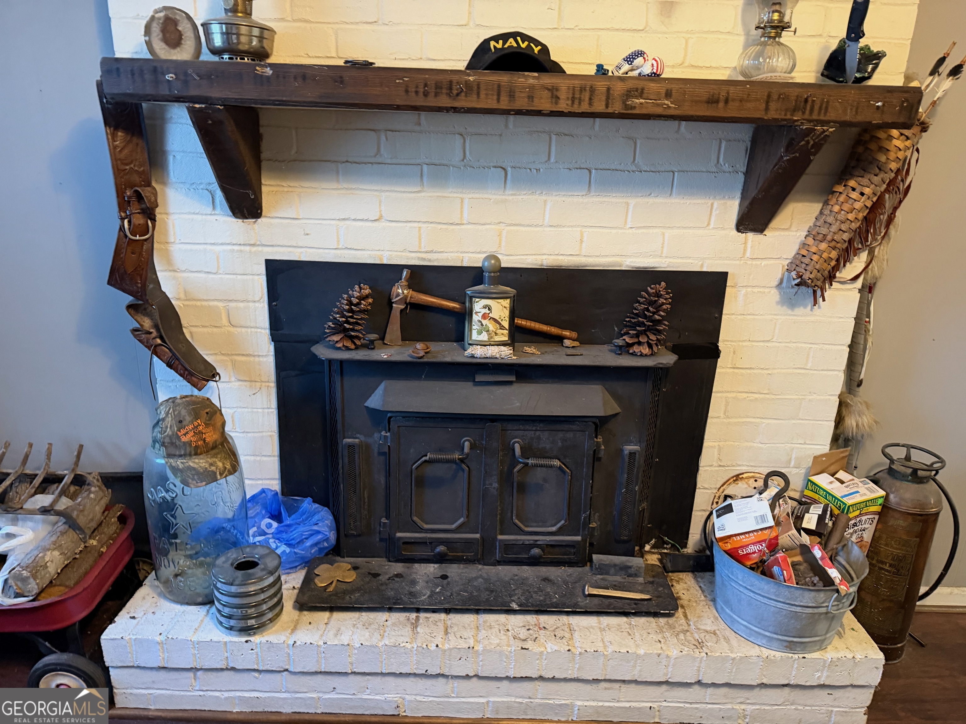 710 Armstrong Mill Road Franklin, GA 30217 - Photo 6 of 19 a stove top oven sitting inside of a kitchen