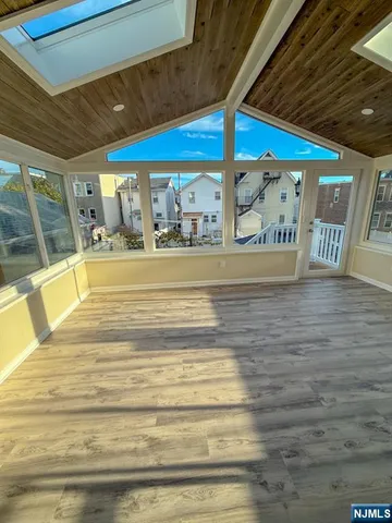 a view of swimming pool with a lounge chair