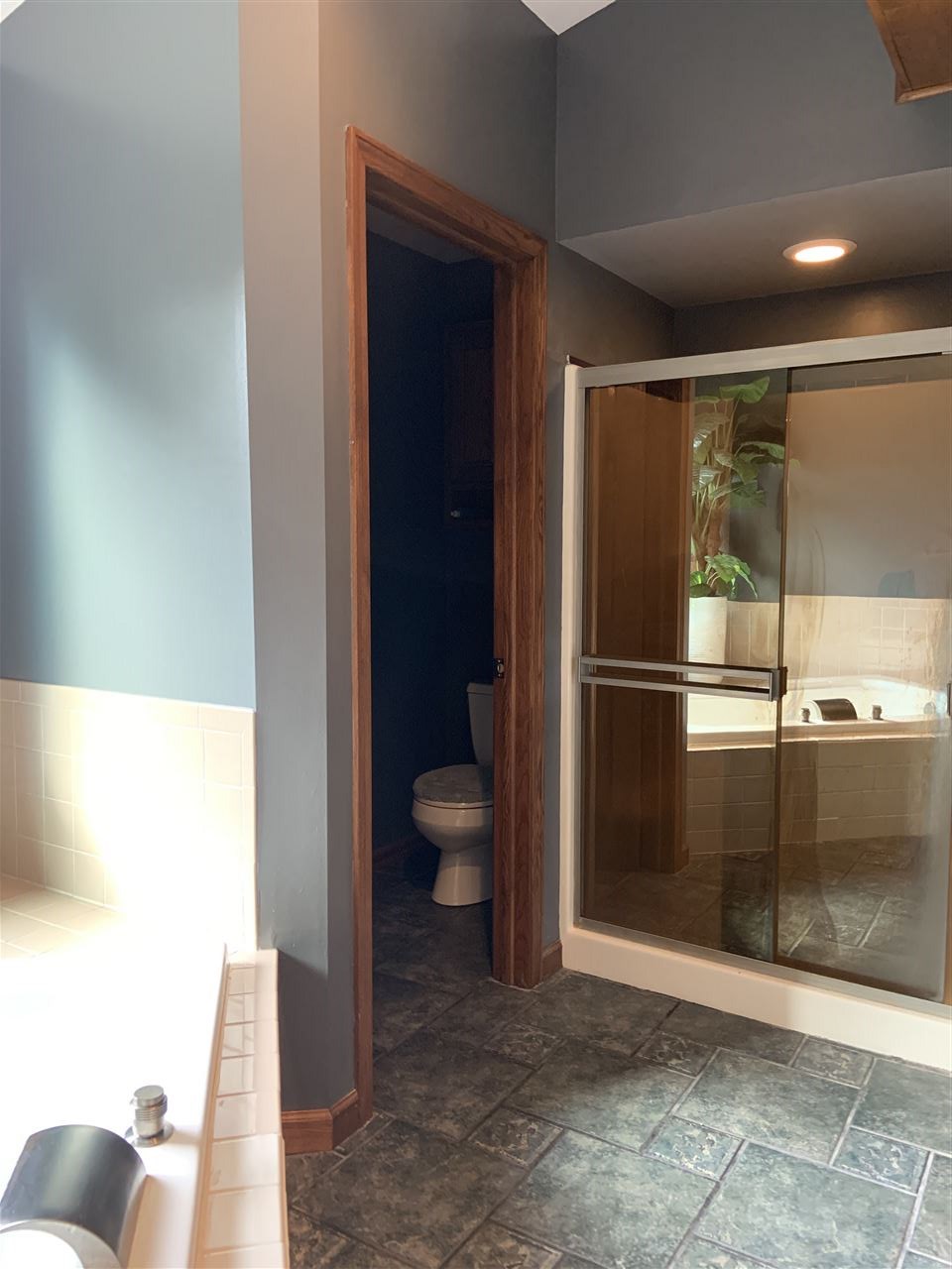 6912 Sentinel Road Rockford, IL 61107 - Photo 23 of 27 a bathroom with a glass shower door
