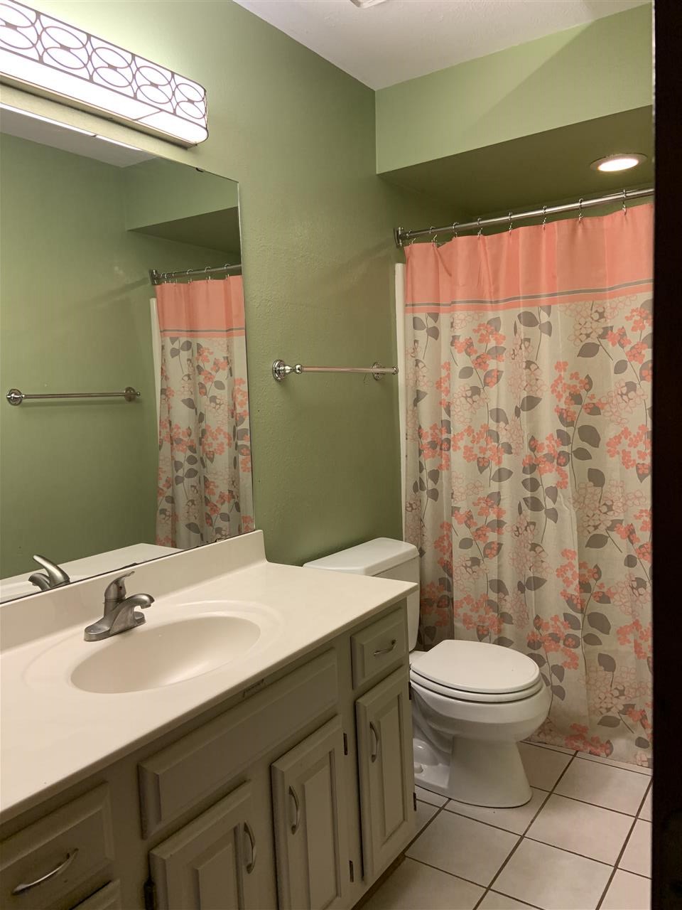 6912 Sentinel Road Rockford, IL 61107 - Photo 26 of 27 a bathroom with a sink a toilet and shower
