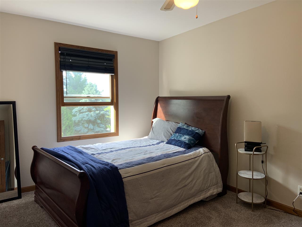 6912 Sentinel Road Rockford, IL 61107 - Photo 27 of 27 a bedroom with a bed and a window
