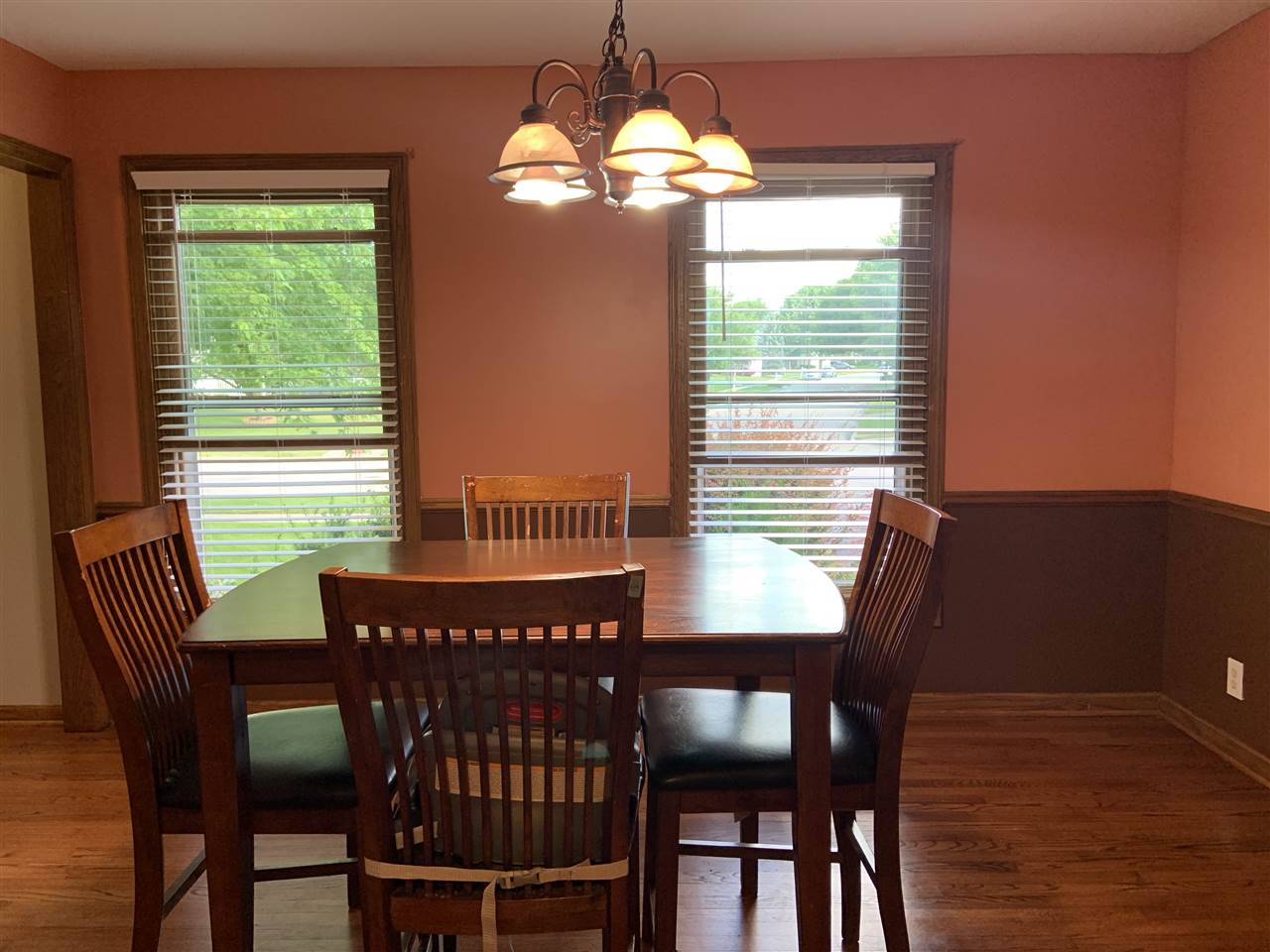 6912 Sentinel Road Rockford, IL 61107 - Photo 9 of 27 a view of a dining room with furniture window and outside view