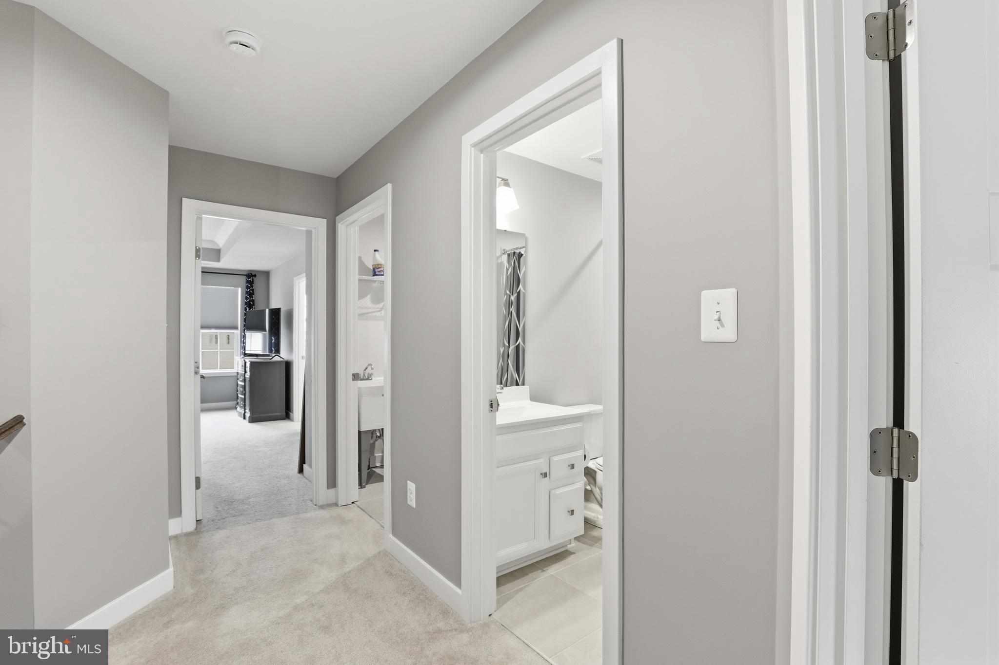 550 Lewes Landing Road Middletown, DE 19709 - Photo 15 of 38 a view of a hallway with bathroom and bathroom