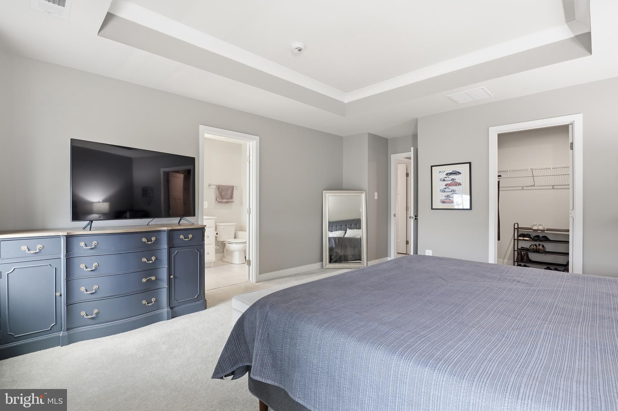 550 Lewes Landing Road Middletown, DE 19709 - Photo 17 of 38 a bedroom with a large bed and a flat screen tv