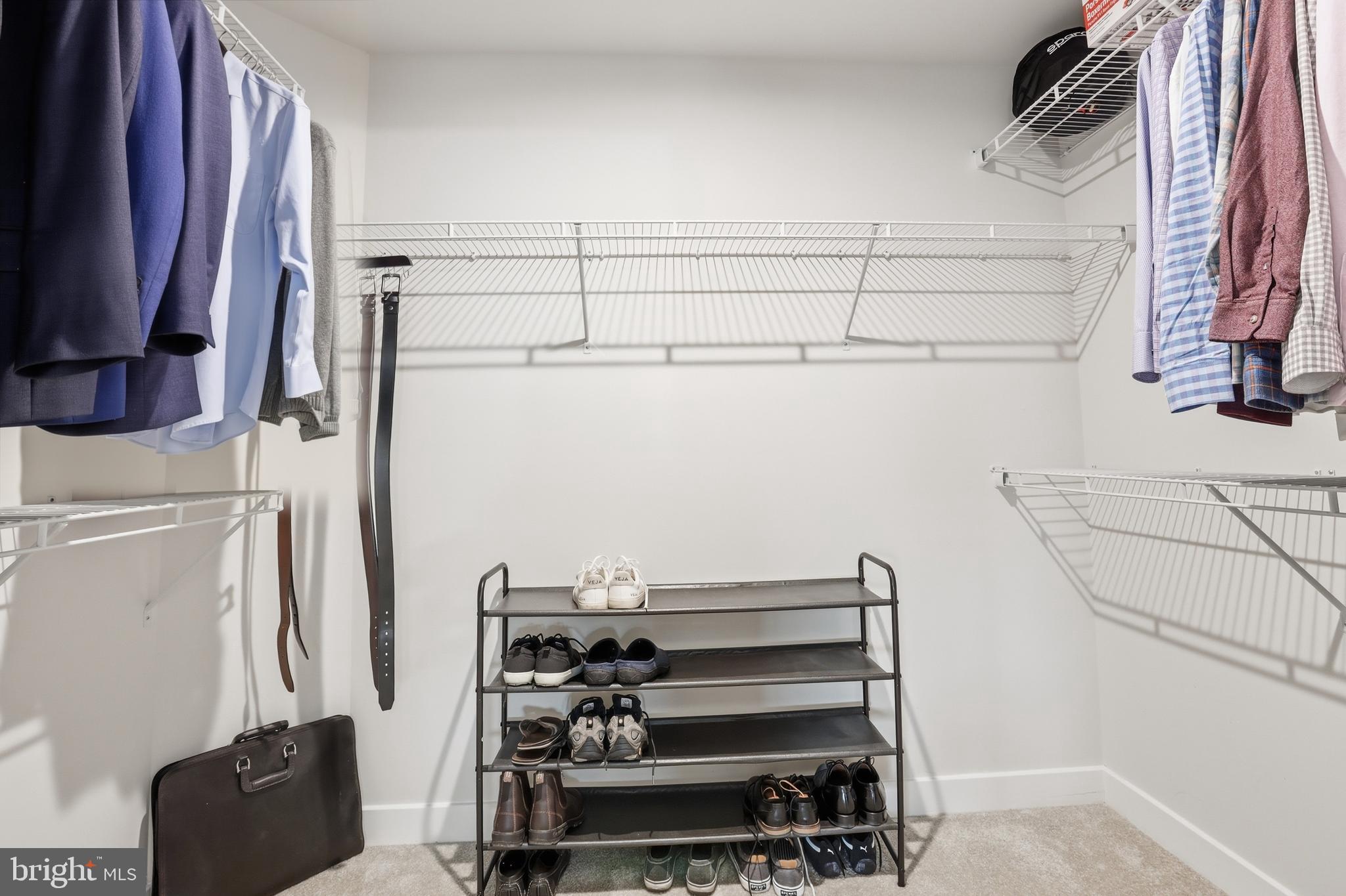 550 Lewes Landing Road Middletown, DE 19709 - Photo 21 of 38 a view of walk in closet with clothes and shoes