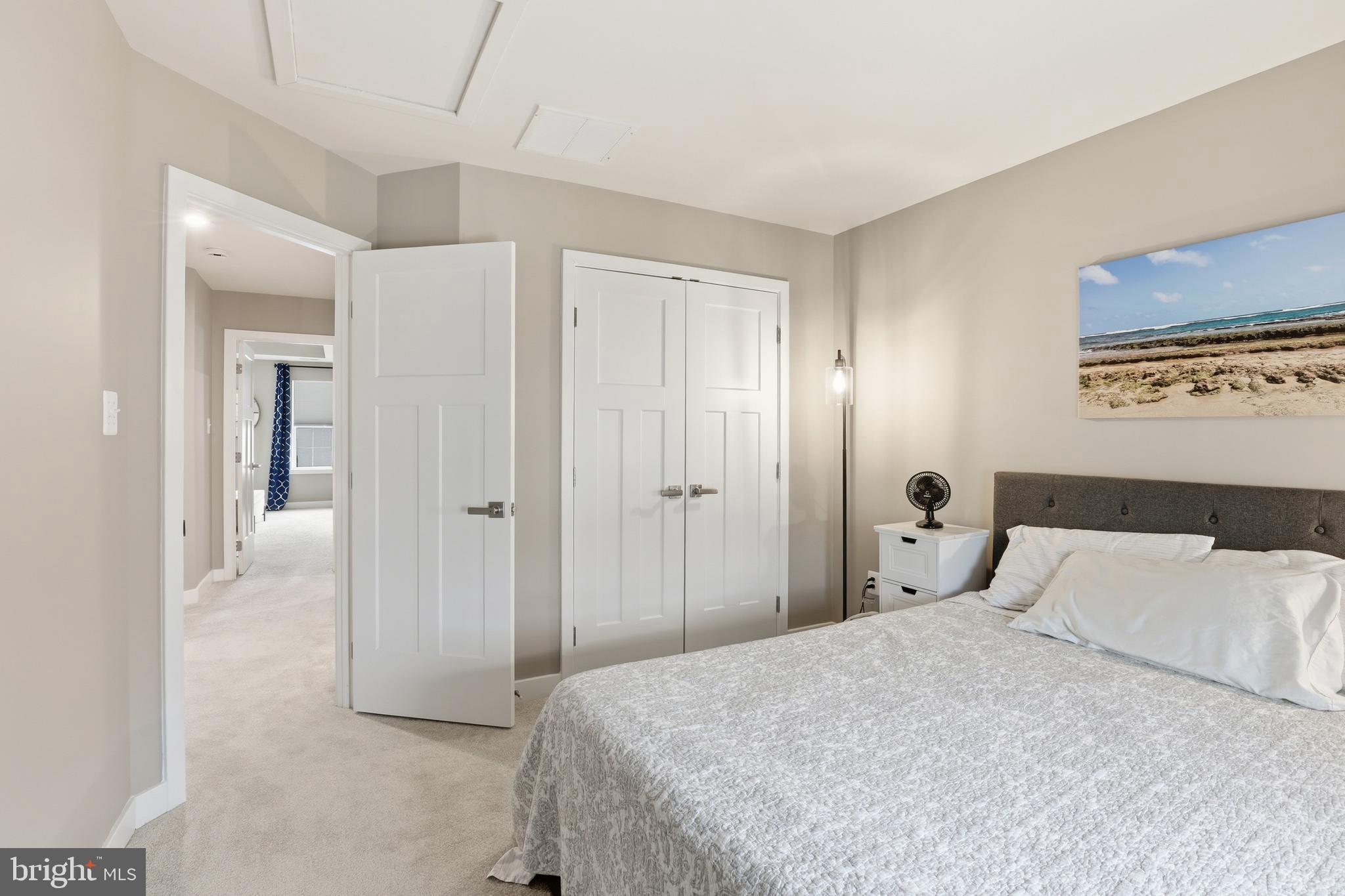 550 Lewes Landing Road Middletown, DE 19709 - Photo 23 of 38 a bedroom with a bed and a walk in closet