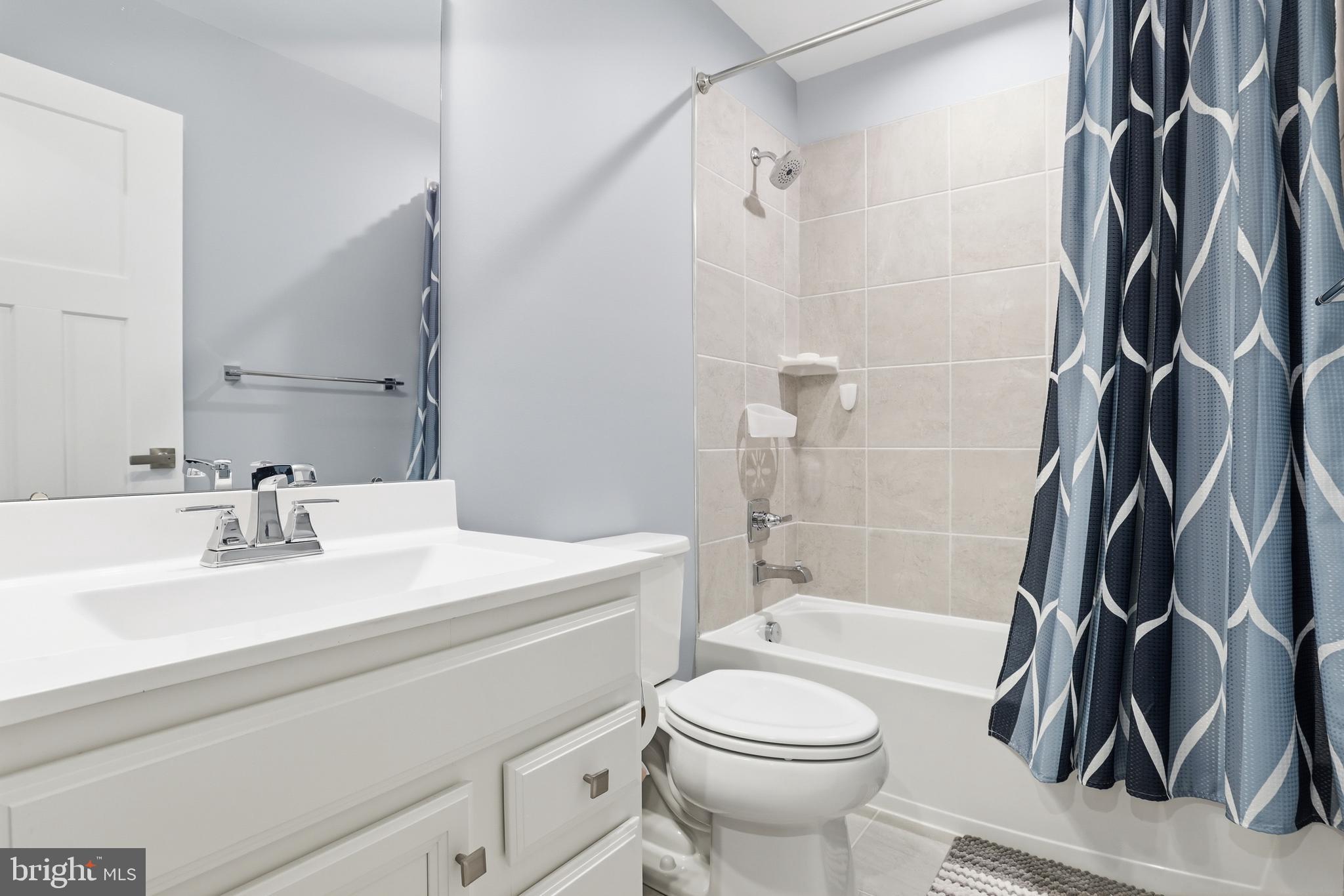 550 Lewes Landing Road Middletown, DE 19709 - Photo 25 of 38 a bathroom with a sink a toilet and shower