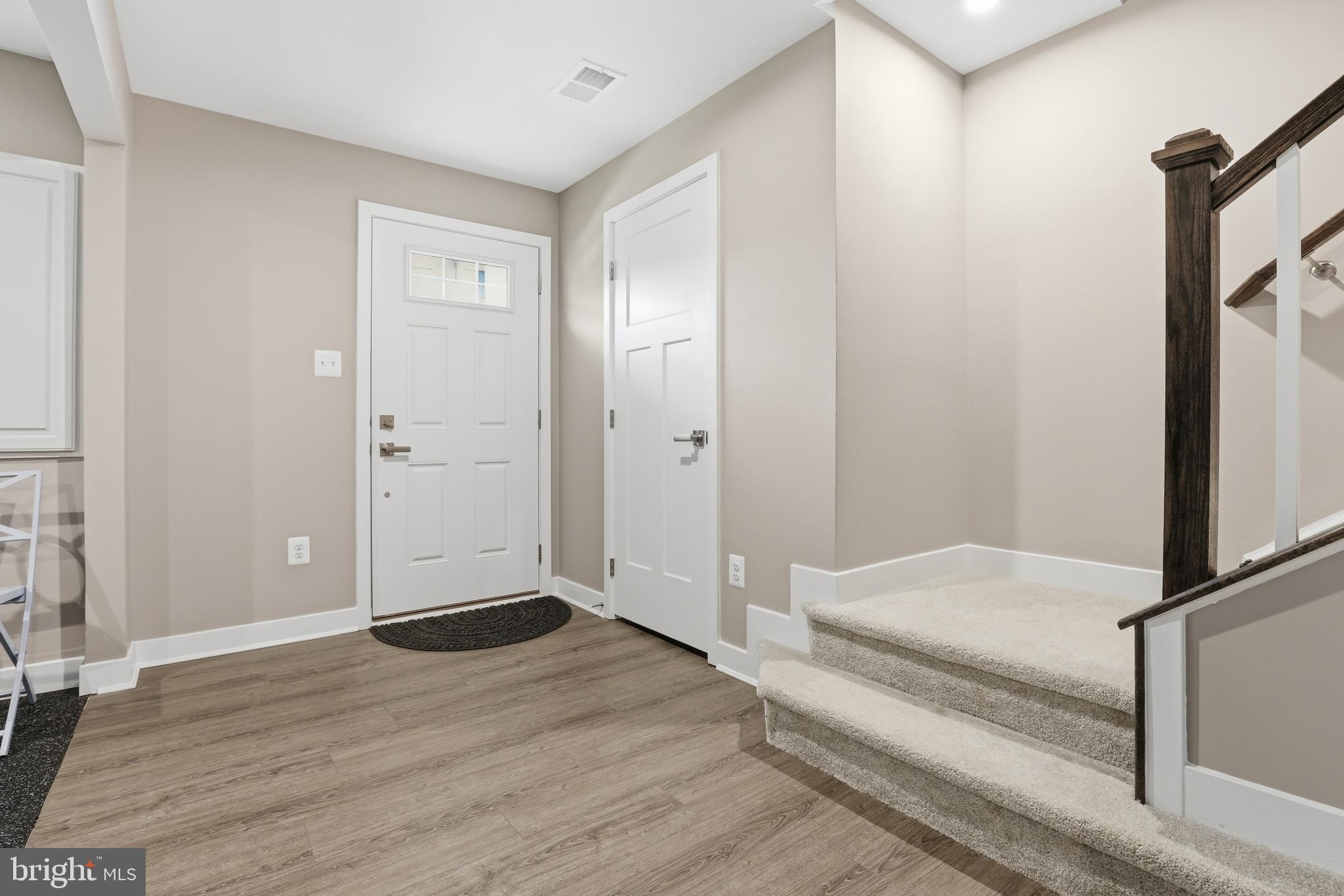 550 Lewes Landing Road Middletown, DE 19709 - Photo 27 of 38 a view of bedroom with wooden floor and bathroom