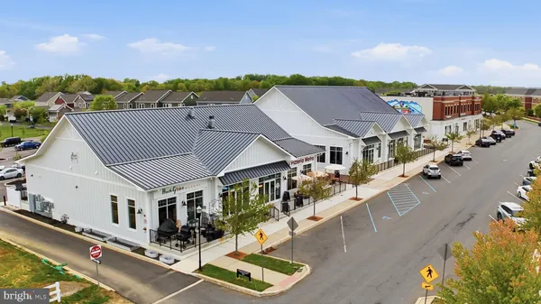 a aerial view of a house with a big yard