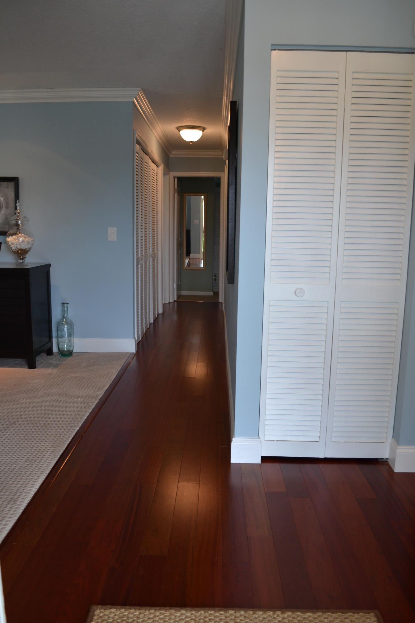201 Southwest 1st Street, Unit 8 Boca Raton, FL 33432 - Photo 3 of 27 a view of a hallway with wooden floor