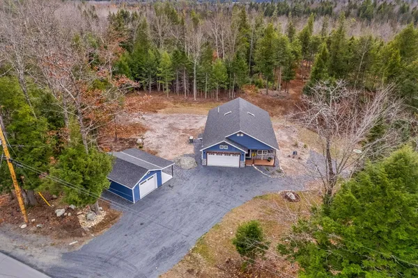 $450,000 | 52 East Shore Road, Embden, ME 04958