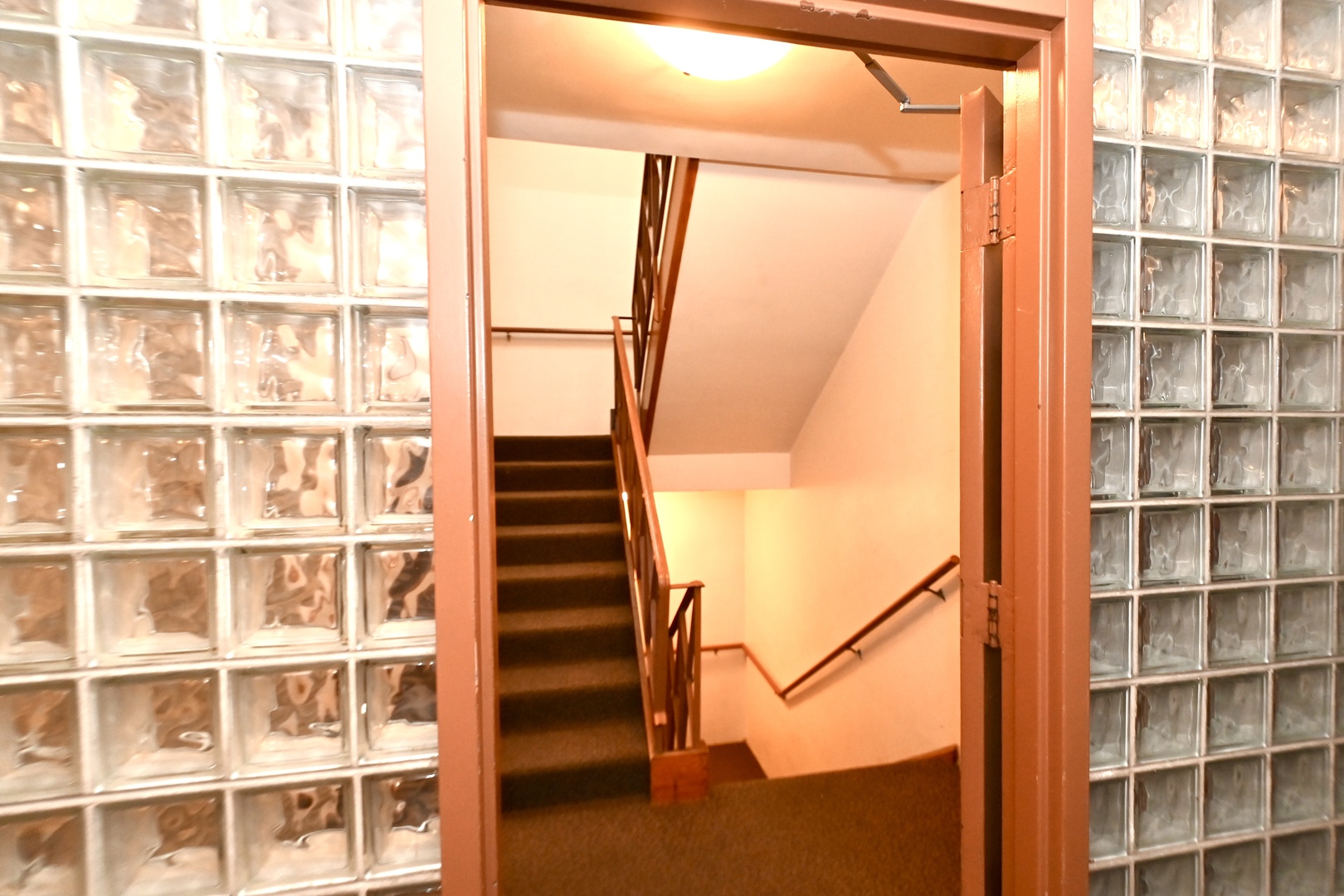 200 Ridge Avenue, Unit 1E Evanston, IL 60202 - Photo 11 of 13 a view of a balcony with wooden floor and windows
