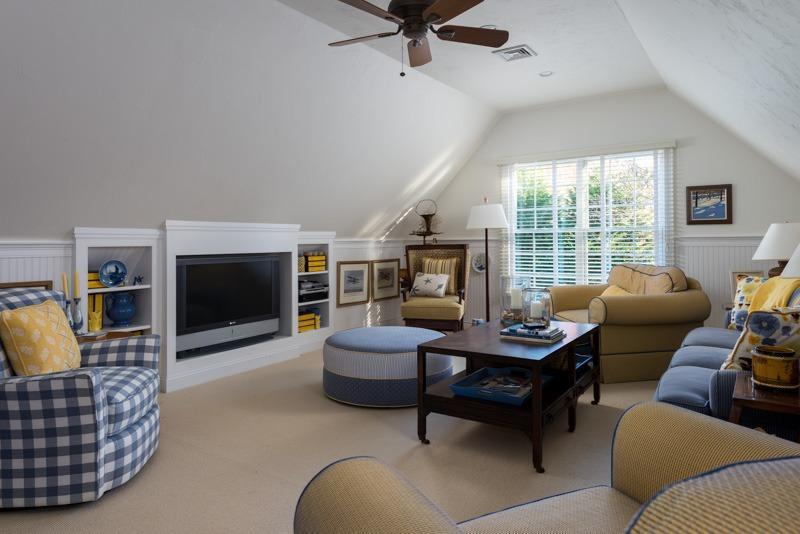 91 Great Bay Road Osterville, MA 02655 - Photo 19 of 27 a living room with furniture fireplace and a flat screen tv