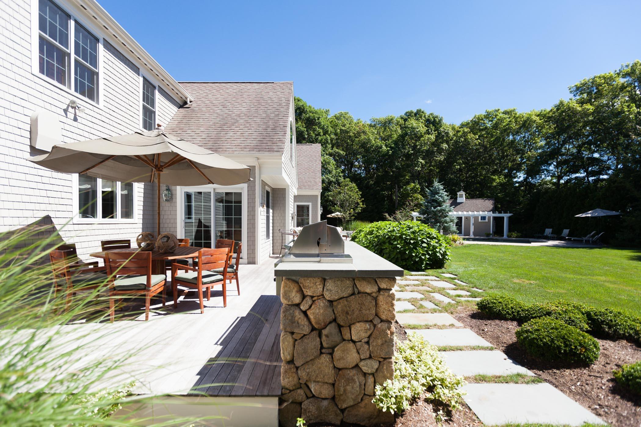 91 Great Bay Road Osterville, MA 02655 - Photo 21 of 27 a view of a house with backyard and sitting area