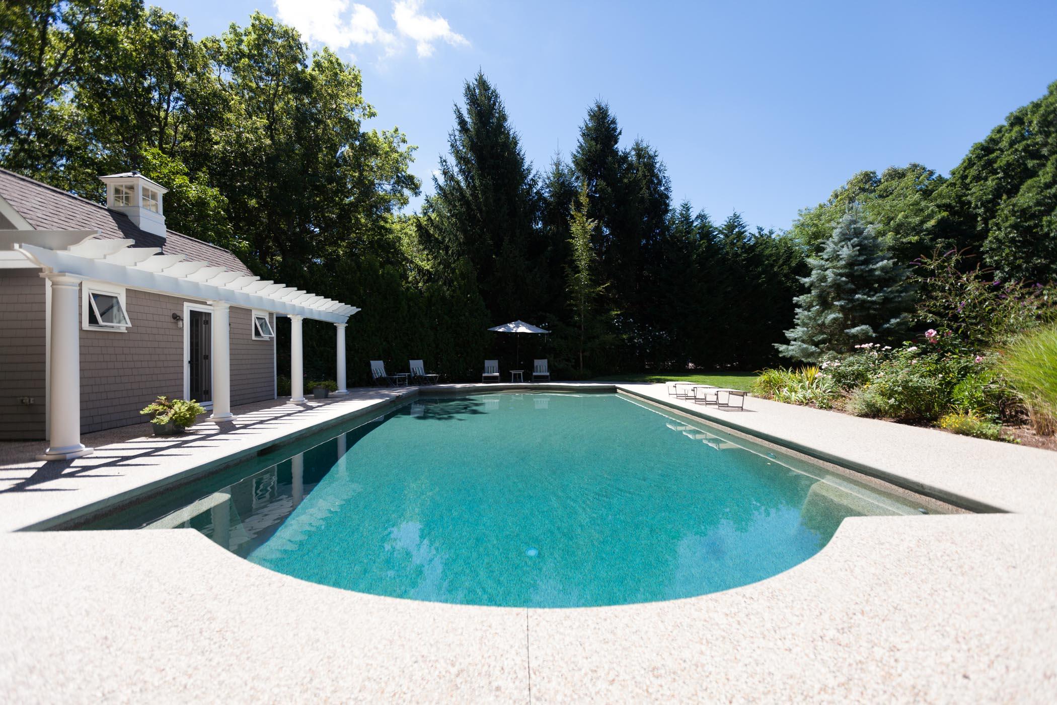 91 Great Bay Road Osterville, MA 02655 - Photo 26 of 27 a swimming pool with outdoor seating and yard