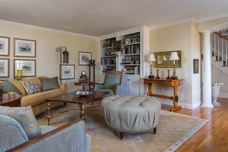 91 Great Bay Road Osterville, MA 02655 - Photo 5 of 27 a living room with furniture and a bookshelf
