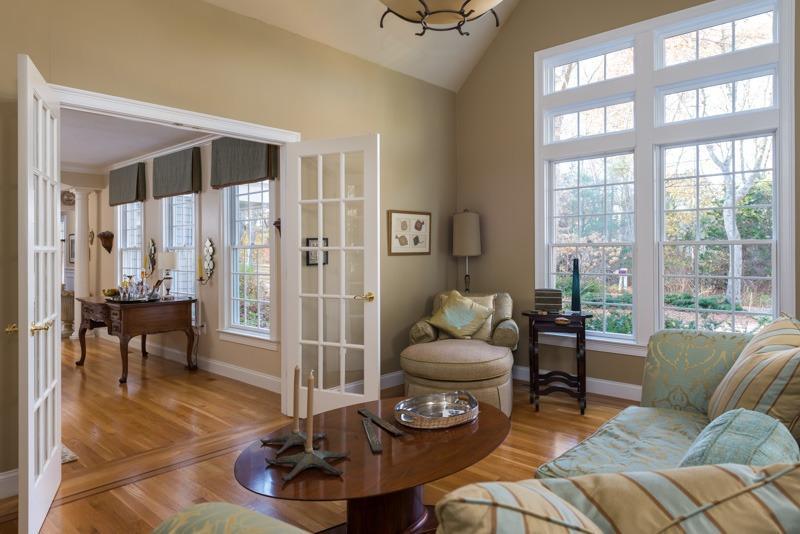 91 Great Bay Road Osterville, MA 02655 - Photo 7 of 27 a living room with furniture and a floor to ceiling window