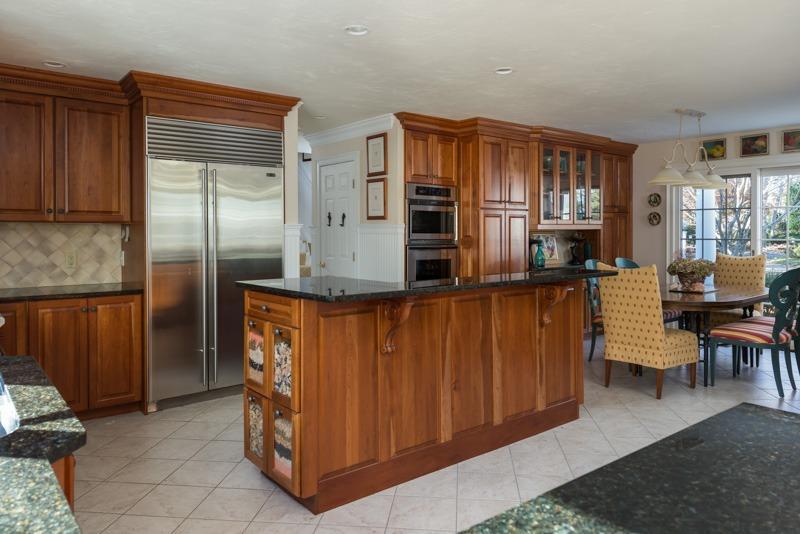 91 Great Bay Road Osterville, MA 02655 - Photo 10 of 27 a kitchen with stainless steel appliances granite countertop a refrigerator and a stove
