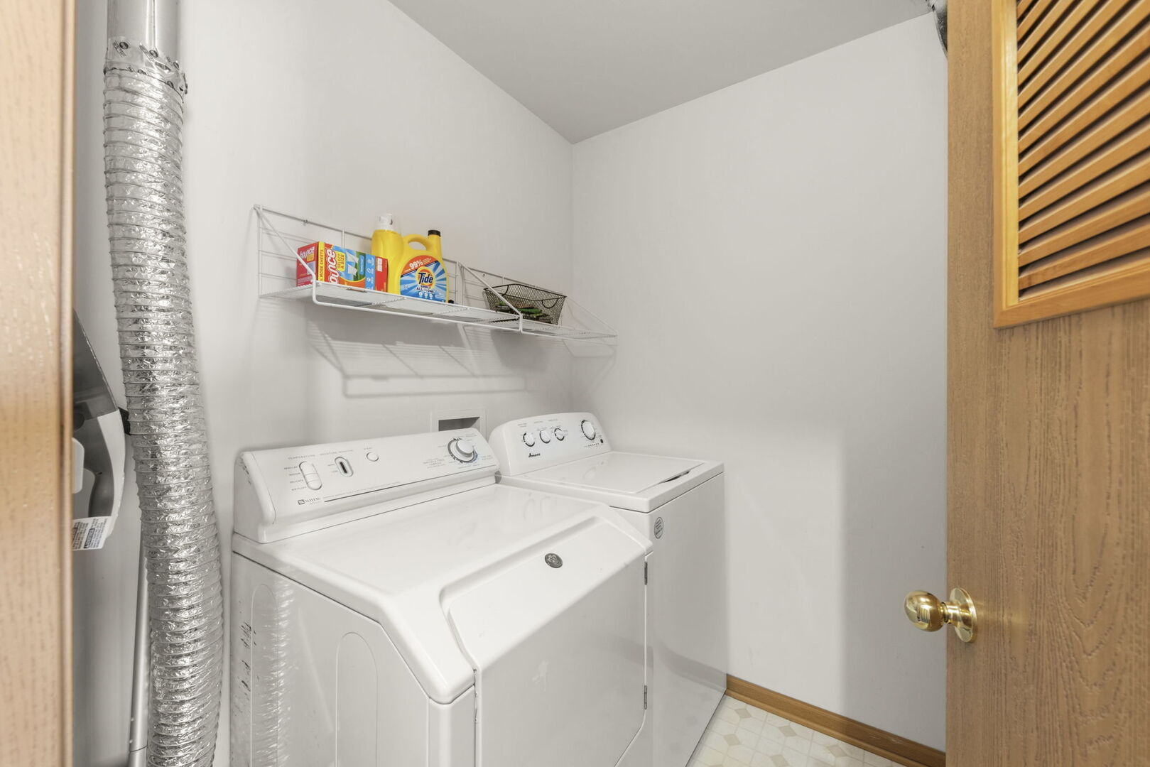 965 Constance Lane, Unit G Sycamore, IL 60178 - Photo 22 of 25 a utility room with dryer and washer