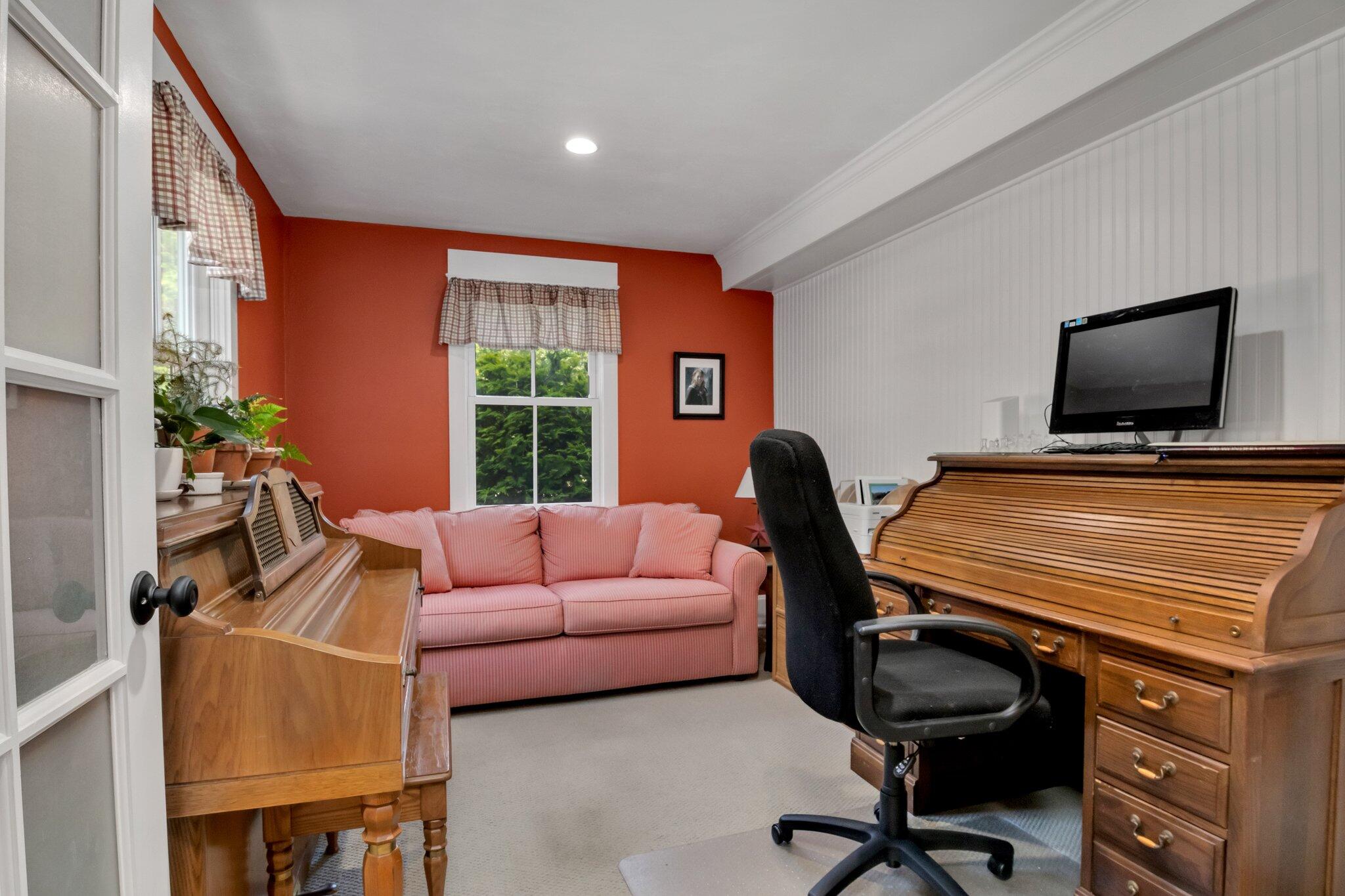 730 Slough Road Brewster, MA 02631 - Photo 13 of 87 a work room with furniture and a flat screen tv