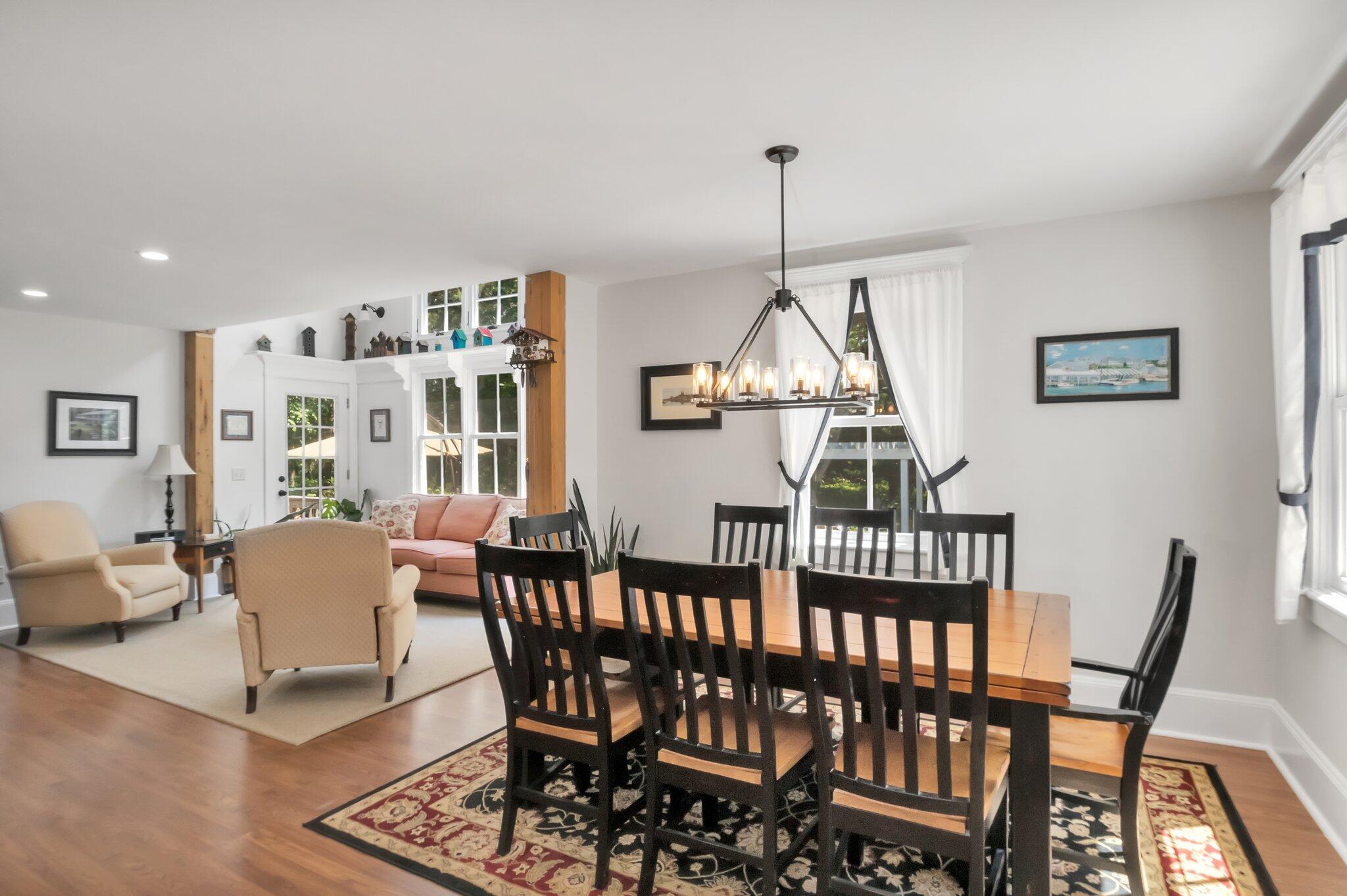 730 Slough Road Brewster, MA 02631 - Photo 25 of 87 a view of a dining room with furniture window and wooden floor