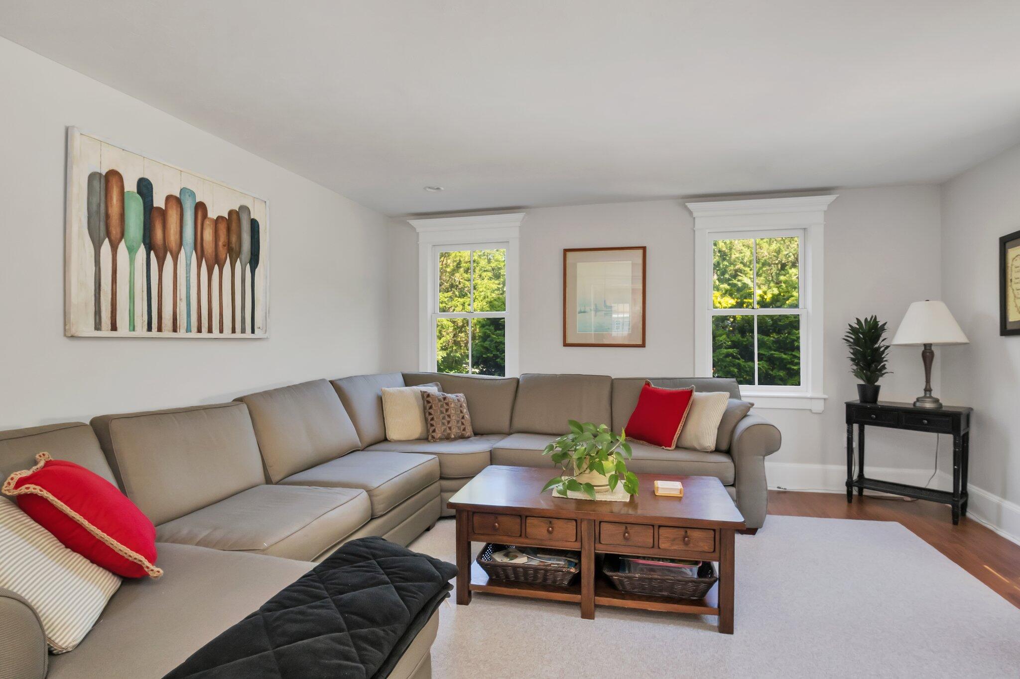 730 Slough Road Brewster, MA 02631 - Photo 30 of 87 a living room with furniture and a window